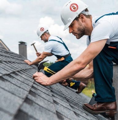 Two Roofing Workers